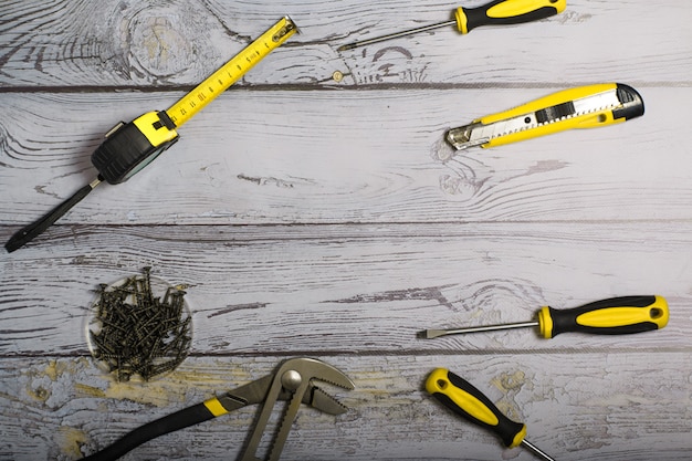 Construction tools on the background. view from above