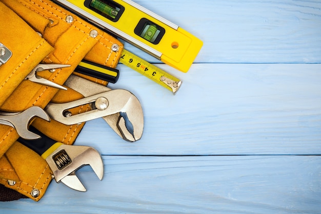 Construction tools on blue boards prepared by craftsman before work