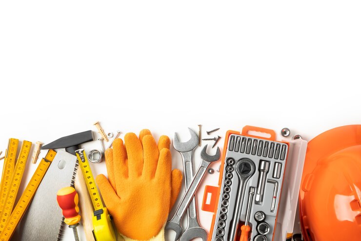Photo construction tools on table, space for text