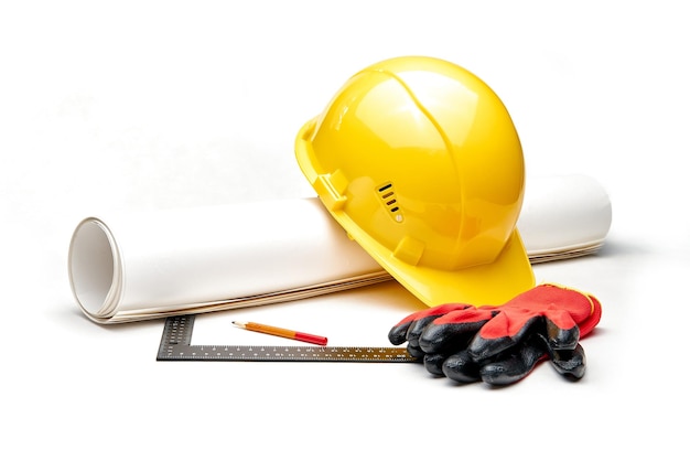 Construction tools on white background Arrangement of hard hat water gauge