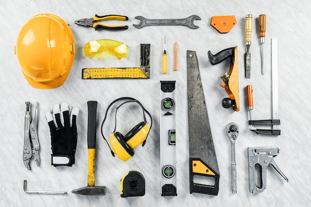 Construction tools on a white background. A collection of construction tools. Construction, repair.