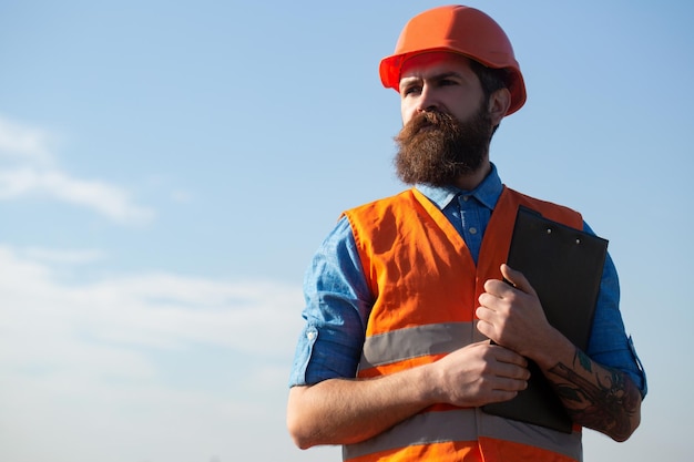 Construction worker on construction site building business improvement and renovation brutal man bui