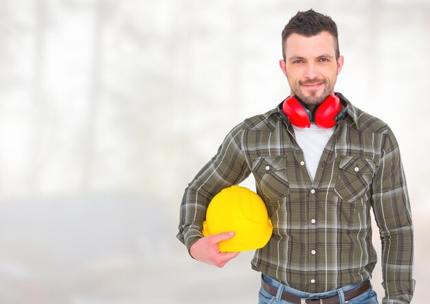 Construction Worker in front of forestry construction site