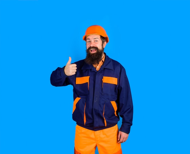 Construction worker in hard hat mechanical worker in uniform shows thumb up bearded man in suit with