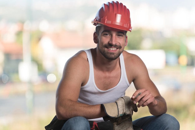 Construction Worker Relaxing The Fresh Air During Work