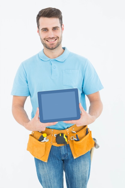 Construction worker showing blank screen on digital tablet