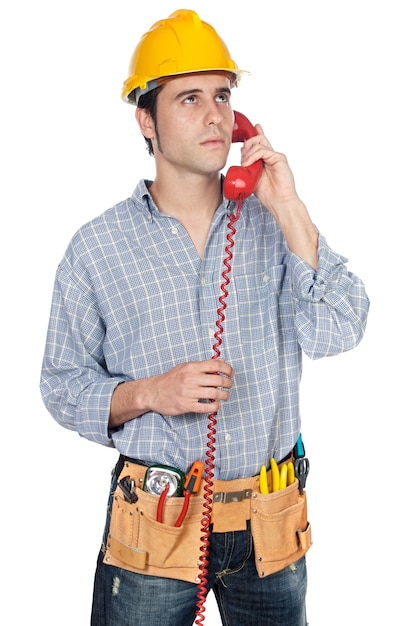 Construction worker talking on the phone over white background