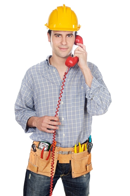 Construction worker talking on the phone over white background