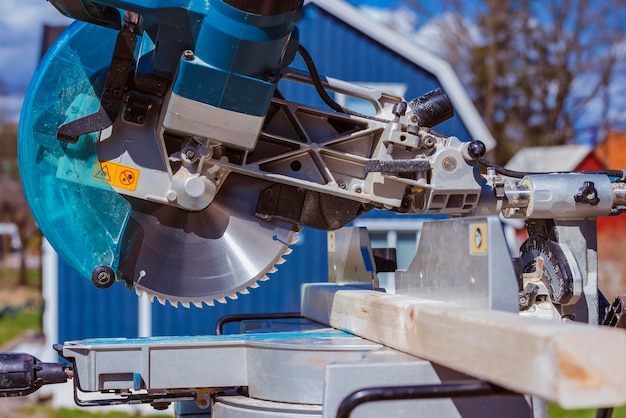 construction worker using with circular saw and plank. construction concept