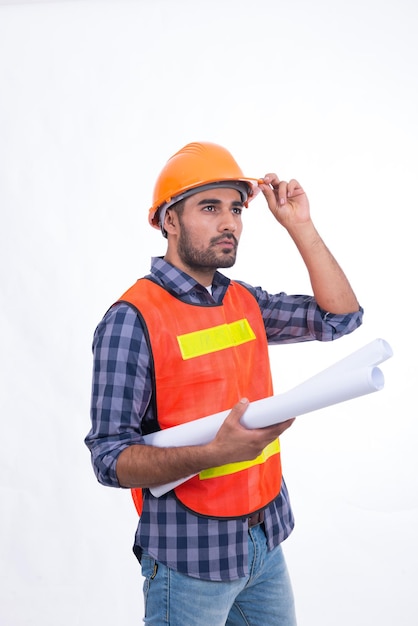 Construction worker wearing safety vest isolated on whiteArabian engineer smile