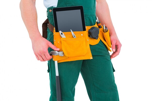 Construction worker wearing tools belt