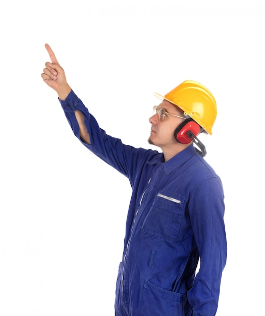 Construction worker with yellow helmet pointing with his hand