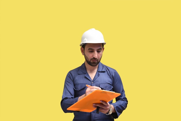 construction worker writing on clipboard indian pakistan model