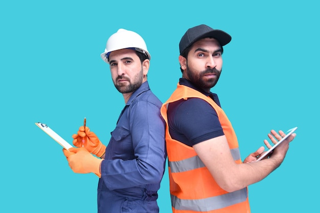 construction workers standing back to back indian pakistani model