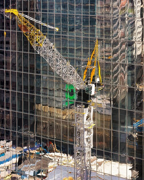 Construction works at Skyscrapers in Financial Center at Lower Manhattan, New York City, America. USA. American architecture building. Panorama of Metropolis NYC. Metropolitan Cityscape