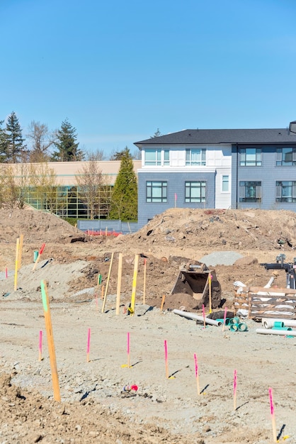 Photo construction zone with new building development on blue sky background