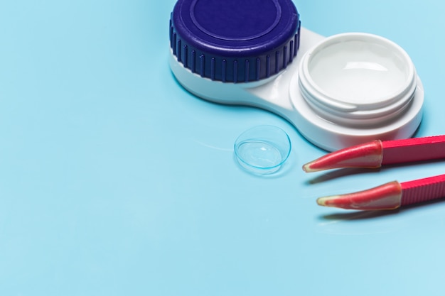 Contact lens, contact lens case, tweezers