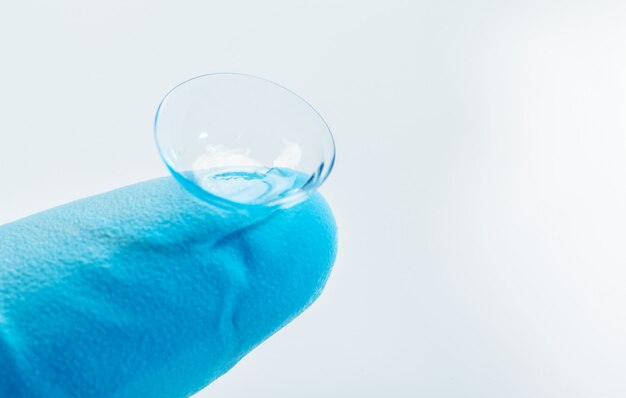 Contact lens on finger