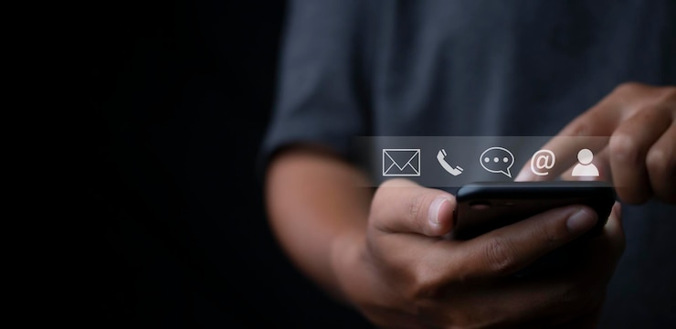 Photo contact us or customer support hotline people connect businessman access contact connect online by smartphone with virtual screen contact icons customer service call center concept copy space