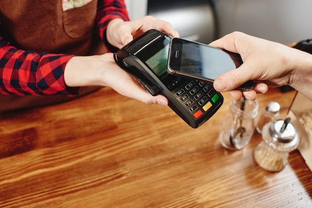 Contactless payment by phone.