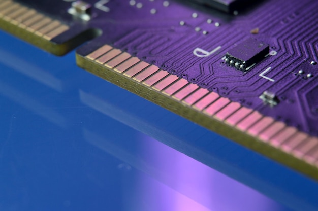 Contacts of a microchip of random access memory close-up.