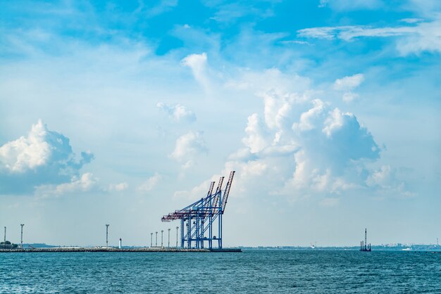 Container cranes in cargo port terminal.