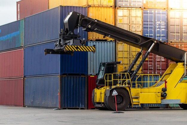 Container handlers Forklift truck in shipping yard Industrial container logistic yard Logistics import export concept