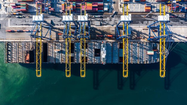 Container ship carrying container import export global business
logistic and transportation by container ship in open sea aerial
view container cargo vessel supply chain company freight
shipping