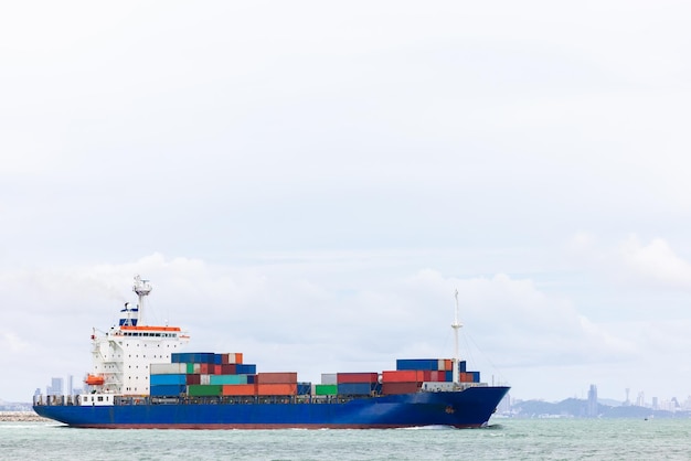 Container ship transporting cargo logistic to import export goods