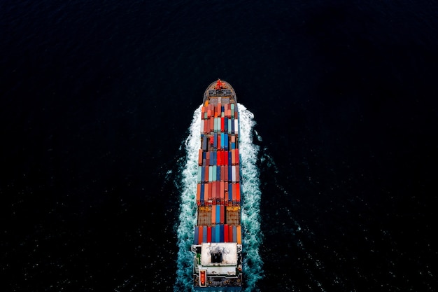 Container ship transporting large cargo logistic import export goods