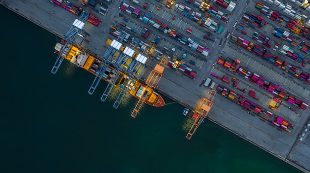 Container ship working at night, Business import export logistic.