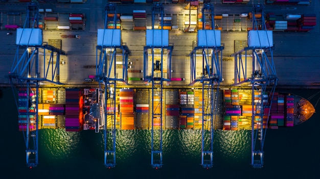 Container ship working at night.