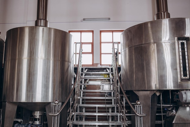 Container with brewed beer in workshop Beer factory