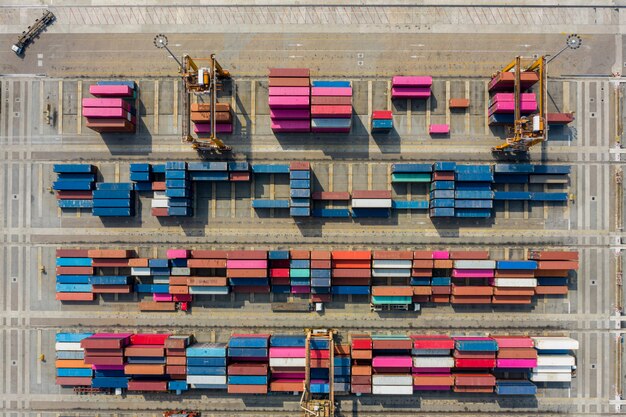 Containers warehouse and crane aerial top view in Thailand