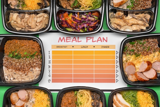 Containers with healthy food and meal plan on color