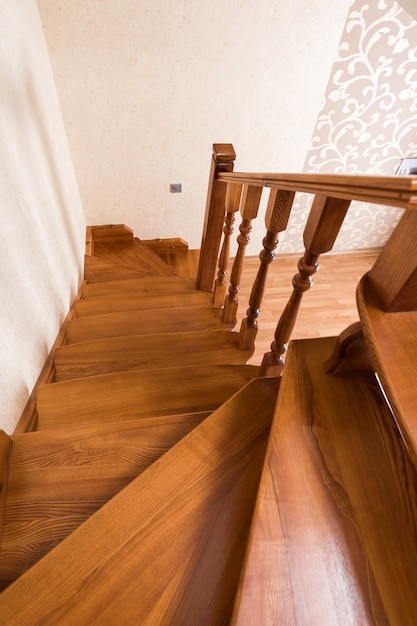 Contemporary brown wooden stairs in the house