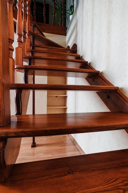 Contemporary brown wooden stairs in the house