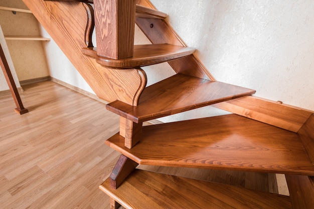 Contemporary brown wooden stairs in the house