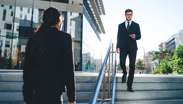 Contemporary business people on street stairway