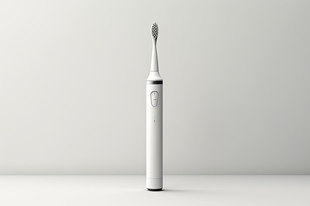 A contemporary electric toothbrush is positioned on a plain white surface It is a convenient device