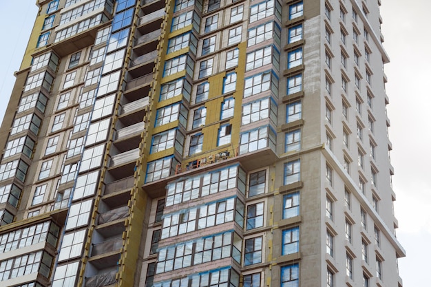 Contemporary highrise apartment buildings frameblock house under construction