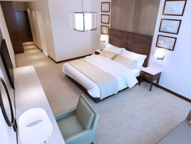 Contemporary hotel room trend with double bed and dressing table and tv. 