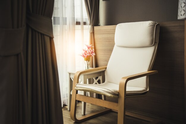 contemporary interior of Living room with part of sofa and white curtain