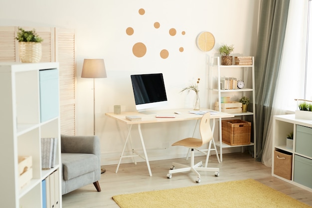 Contemporary workspace interior in modern room at home in daylight, horizontal no people shot