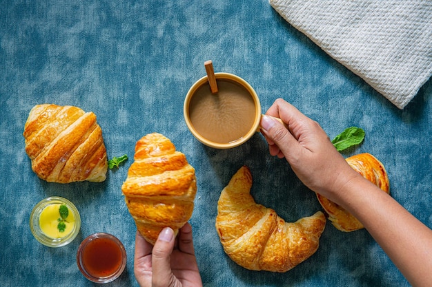 Continental breakfast captured from above top view flat lay Coffee orange juice croissants