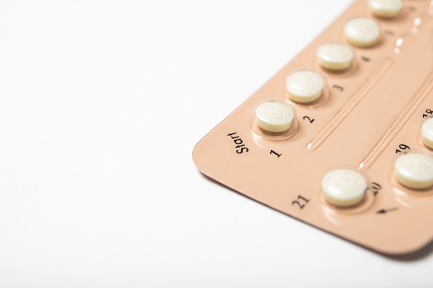 Contraceptive pill blisters on a white background