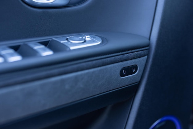 Photo control buttons for settings and memory of the drivers seat in the interior of the electric car