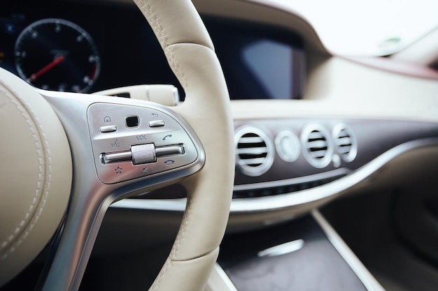 Control buttons on steering wheel Car interior Shallow dof