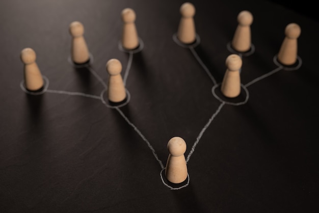 Control concept. Figures on a chalk board. Chalk arrows