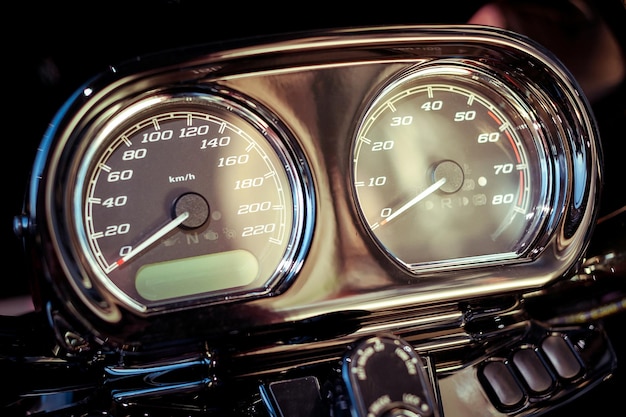 Photo control panel on modern motorbike close up